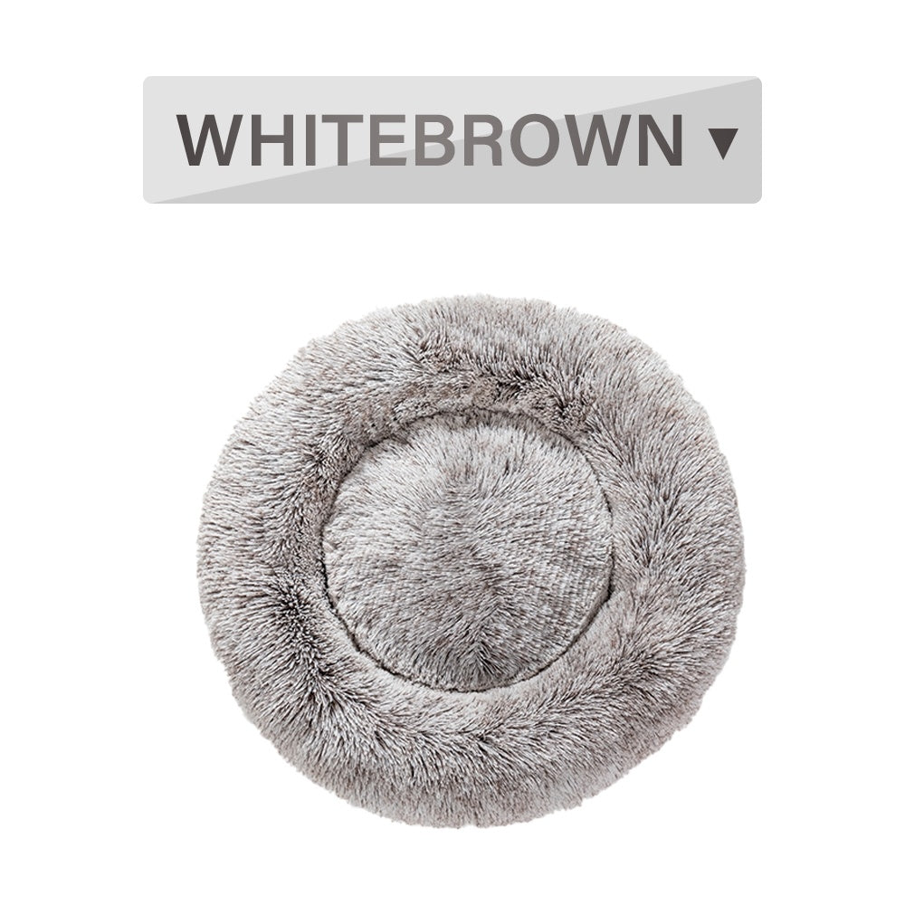 Fluffy donut dog bed in gray color providing ultimate comfort for pets to rest