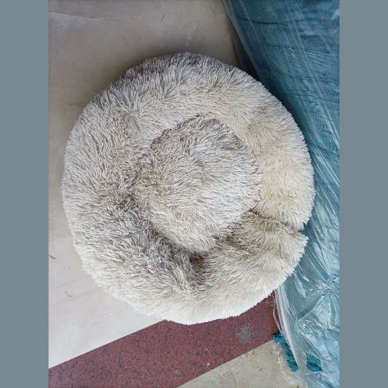 Soft gray pet bed with plush lining for dogs and cats