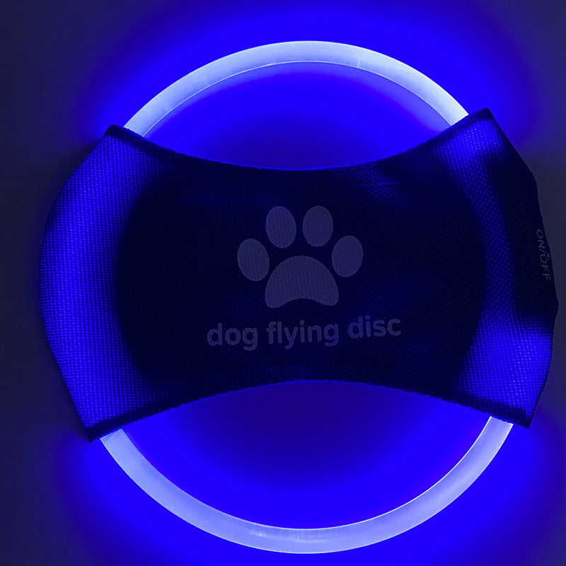 Petpal LED dog flying disc glowing in blue light for nighttime play and exercise