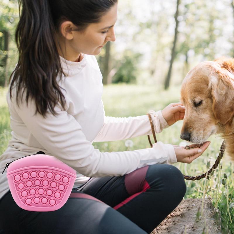 Portable pet treat storage in pink, perfect for outdoor use with dogs and easy access to treats