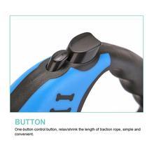 Close-up of a blue telescopic dog leash with a button for easy length adjustment