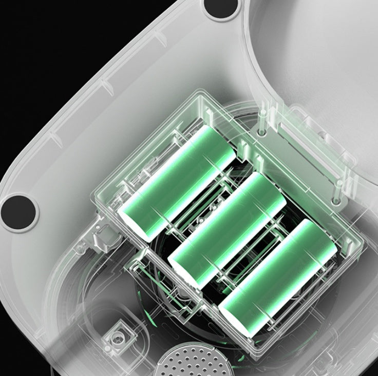 Interior view of the voice recorder pet food dispenser showing battery compartments and design details