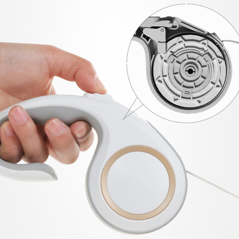 Hand holding a Petpal automatic pet traction rope with sleek design for easy walking