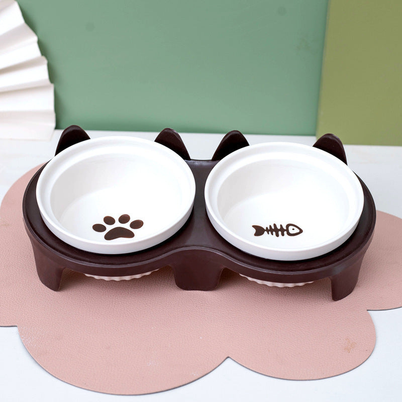 Ceramic cat bowl set with cute paw and fish designs for stylish feeding stations