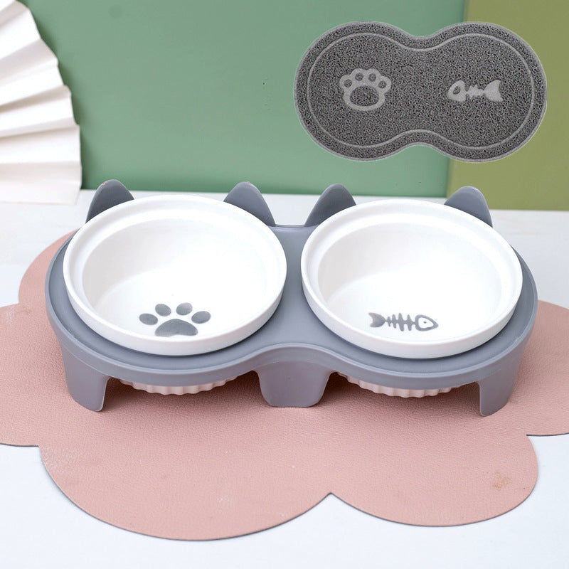 Ceramic cat bowl set with cute paw and fish designs for stylish pet feeding