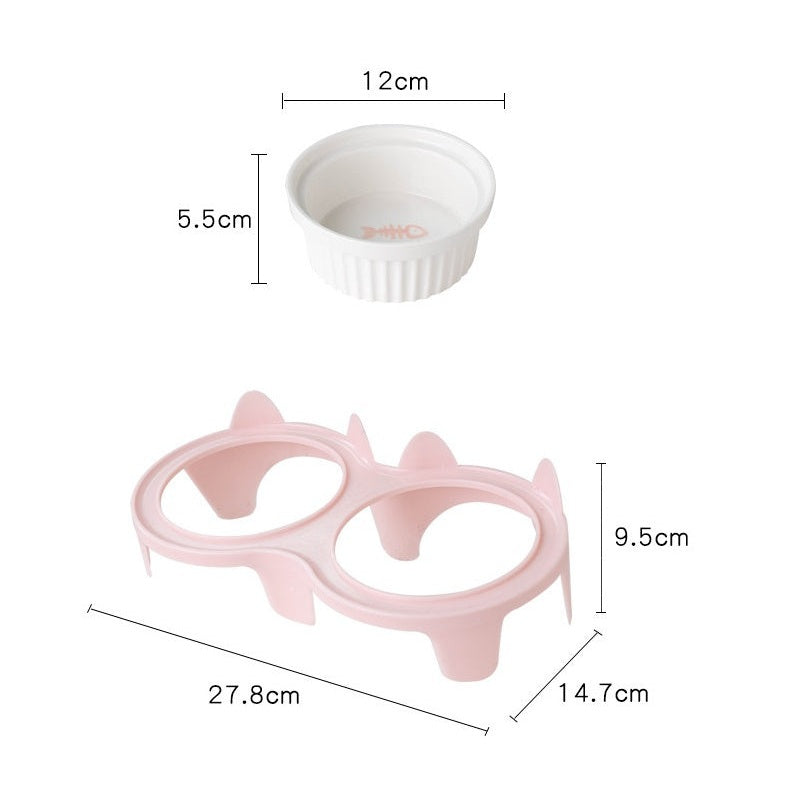 Ceramic cat bowl set in two compartments with a pink holder for comfortable feeding