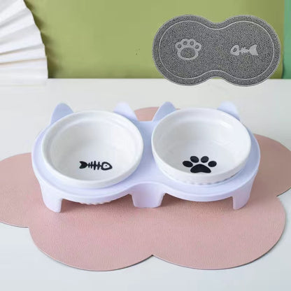 Ceramic cat bowl set featuring a cute design with fish and paw prints for pet feeding