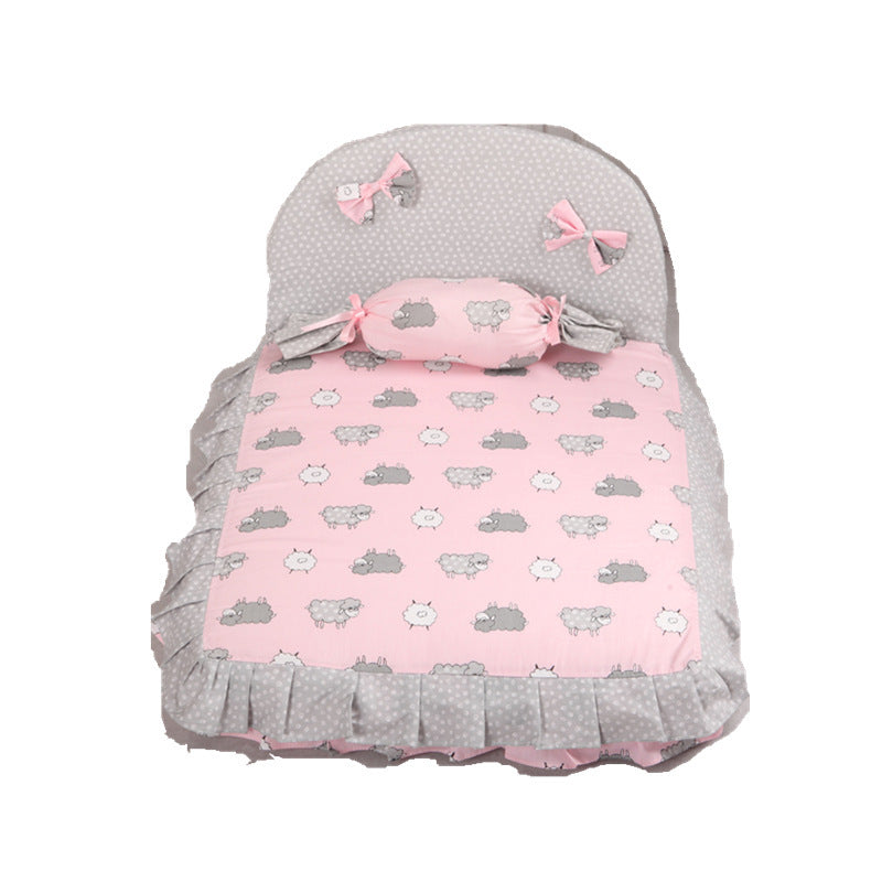 Creative dog mat in pink and gray with playful sheep design and decorative bows for stylish pet comfort