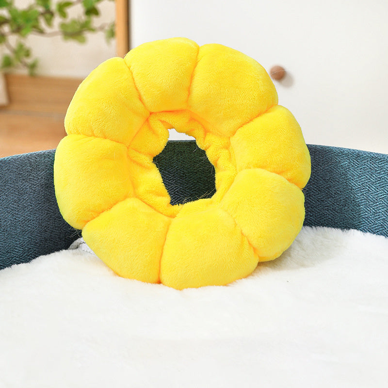 Cute sunflower pet recovery collar in bright yellow, designed for pet comfort during healing
