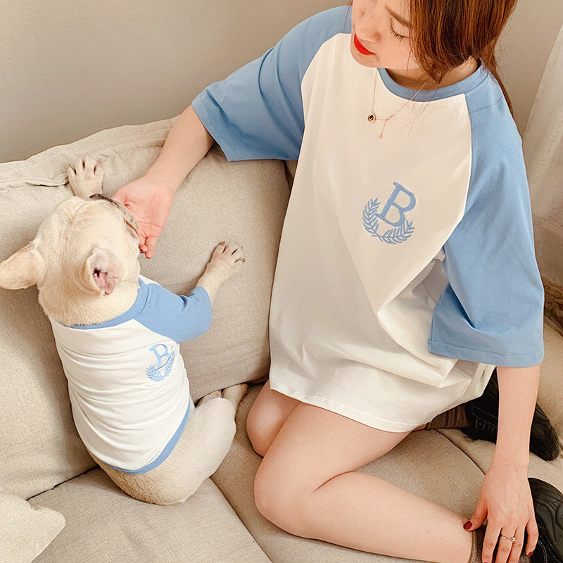 Woman and dog wearing matching shirts from Petpal accessories showcasing dog parent-child matching clothes