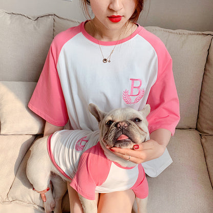 Dog parent-child matching clothes in pink and white with logo for stylish pet owners