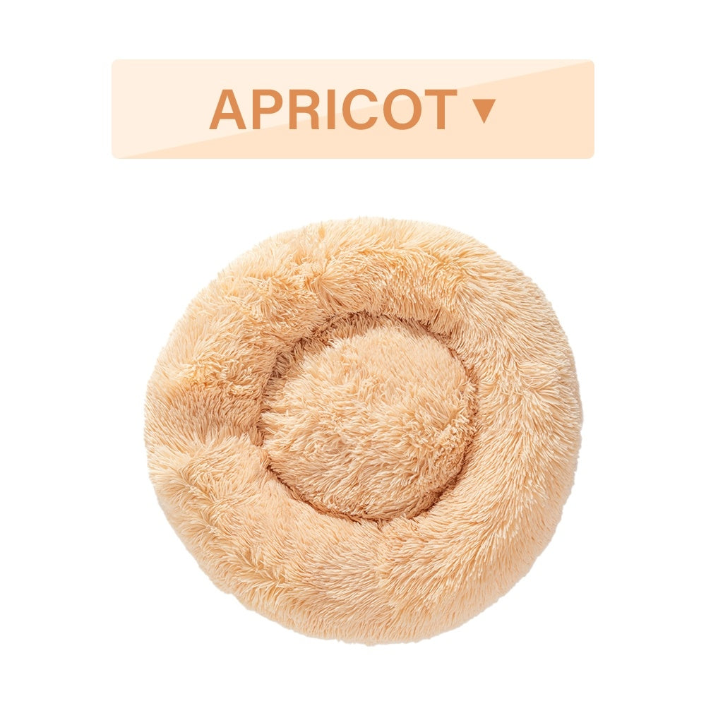 Fluffy donut dog bed in apricot color, designed for ultimate comfort and relaxation for pets