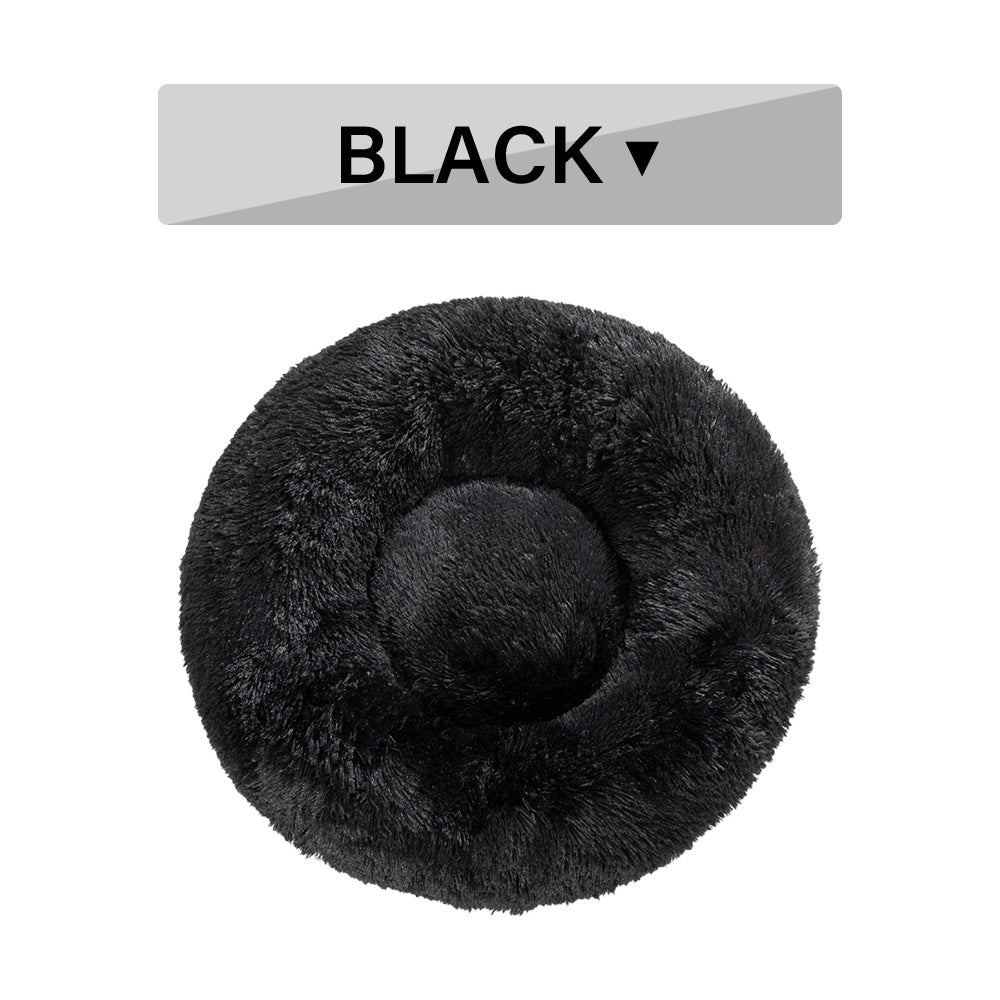 Fluffy donut dog bed in black, cozy design for optimal pet comfort and relaxation