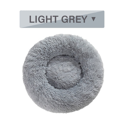 Fluffy donut dog bed in light grey, perfect for cozy naps and comfort for pets