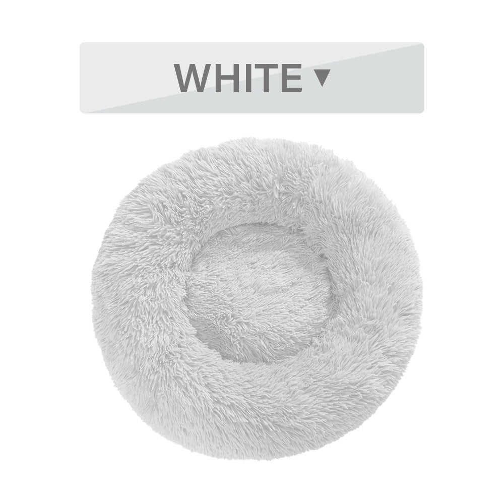 Fluffy donut dog bed in white, ideal for small dogs to snuggle and relax comfortably