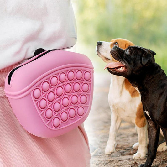 Pink portable pet treat storage for easy access during walks or outdoor adventures with dogs