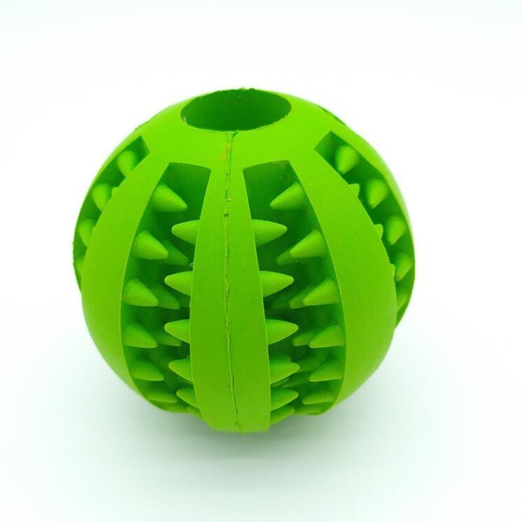 Bright green rubber dog ball toy with textured spikes for added grip and fun playtime