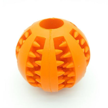 Bright orange rubber dog ball toy with spiky texture for enhanced grip and playtime fun